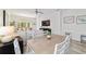 Open-concept living room and dining area offers ample seating and natural light, perfect for entertaining at 9309 Sw 106Th Ave, Ocala, FL 34481