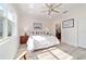 Light-filled main bedroom with a plush bed, side tables, and peaceful ambiance at 9309 Sw 106Th Ave, Ocala, FL 34481