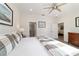 Comfortable main bedroom offers a view of the en suite bathroom and an open doorway to the living space at 9309 Sw 106Th Ave, Ocala, FL 34481