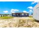 Large backyard with a shed and privacy fence, providing ample space for outdoor activities and storage at 10291 Se 67Th Ter, Belleview, FL 34420