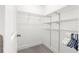 Walk-in closet showcasing built-in shelving for optimal storage and organization solutions at 10291 Se 67Th Ter, Belleview, FL 34420
