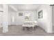 Bright dining area features stylish white seating and a large window offering natural light at 10291 Se 67Th Ter, Belleview, FL 34420