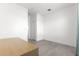 A bright open area with neutral colored walls, tile flooring, and an adjacent closet at 10291 Se 67Th Ter, Belleview, FL 34420