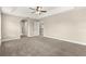 Bedroom with plush carpet, ceiling fan, and neutral walls at 10313 Sw 45Th Ave, Ocala, FL 34476