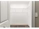 Empty walk-in closet with carpet flooring and wire shelving at 10313 Sw 45Th Ave, Ocala, FL 34476