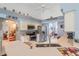 Bright kitchen offering lots of counter space, stainless appliances and views to the dining and living areas at 10716 Sw 53Rd Cir, Ocala, FL 34476