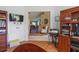 Open-concept living room with view to the kitchen and a doorway to other rooms at 10716 Sw 53Rd Cir, Ocala, FL 34476
