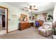 Spacious bedroom featuring a ceiling fan and ample natural light creating a calming and inviting atmosphere at 11237 Sw 78Th Ct, Ocala, FL 34476