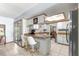 Eat-in kitchen features counter seating and stainless appliances at 11237 Sw 78Th Ct, Ocala, FL 34476