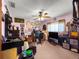 Cozy office space with a ceiling fan, lots of light and plenty of wall decor at 11237 Sw 78Th Ct, Ocala, FL 34476