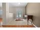Foyer featuring a decorative glass door, tile flooring, and wood accents at 11521 Se 1St Street Rd, Silver Springs, FL 34488
