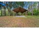 An open-air pavilion surrounded by mature trees at 11521 Se 1St Street Rd, Silver Springs, FL 34488