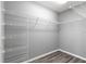 Walk-in closet equipped with wire shelving for optimal storage and organization at 12472 Se 67Th Terrace Rd, Belleview, FL 34420