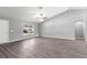 Bright and airy living room featuring a neutral color scheme, modern floors, and a ceiling fan at 12472 Se 67Th Terrace Rd, Belleview, FL 34420