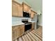 Bright kitchen featuring stainless steel appliances, sleek countertops, and ample wooden cabinet space at 13303 Sw 106Th Pl, Dunnellon, FL 34432