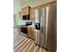 Stylish kitchen with stainless steel appliances, granite countertops, and sleek, modern design at 13303 Sw 106Th Pl, Dunnellon, FL 34432