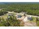 A scenic view of homes nestled among trees in a tranquil neighborhood with plenty of space at 13561 Sw 85Th Pl, Dunnellon, FL 34432