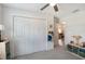Bedroom with ceiling fan, a closet, and neutral colors at 13561 Sw 85Th Pl, Dunnellon, FL 34432
