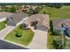 Charming single-story home with a well-manicured lawn, lush landscaping, and a two-car garage at 1377 Sw 161St Pl, Ocala, FL 34473