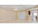 Bright, open living room featuring tile floors, recessed lights, and seamless flow into the kitchen at 1377 Sw 161St Pl, Ocala, FL 34473