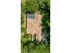 Aerial view showcasing the property's layout, pool, and lush surroundings at 1675 Se 73Rd Pl, Ocala, FL 34480