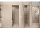 This bathroom features a walk-in shower, toilet, and wire shelving for optimal storage at 1675 Se 73Rd Pl, Ocala, FL 34480