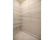Spacious walk-in closet with organized wire shelving at 1675 Se 73Rd Pl, Ocala, FL 34480