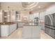 Gourmet kitchen boasting granite countertops, stainless steel appliances, and a center island at 1675 Se 73Rd Pl, Ocala, FL 34480