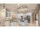 Modern kitchen equipped with stainless steel appliances, custom cabinets, and center island at 1675 Se 73Rd Pl, Ocala, FL 34480