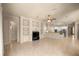 Spacious living area connecting the kitchen and entertainment center, great for gatherings at 1675 Se 73Rd Pl, Ocala, FL 34480