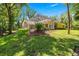 Large screened enclosure in backyard provides ample space for outdoor activities at 1675 Se 73Rd Pl, Ocala, FL 34480