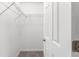 Walk-in closet with plenty of shelving for organized storage and easy access at 21301 Sw Rainbow Lakes Blvd, Dunnellon, FL 34431