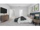 Calming main bedroom with a comfortable bed, stylish furniture, and elegant accents at 2254 Amberly Ave, Orlando, FL 32833