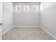 An organized walk-in closet with white wire shelves and ample storage space at 2254 Amberly Ave, Orlando, FL 32833