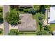 Aerial view of the home featuring a well-maintained roof, backyard, and landscaping at 2417 Se 23Rd St, Ocala, FL 34471