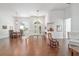 Spacious living area showcases hardwood flooring, white walls, and an open-concept design at 2417 Se 23Rd St, Ocala, FL 34471