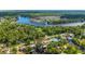 A beautiful neighborhood along the river surrounded by green trees and other bodies of water at 24628 Fox Rd, Astor, FL 32102