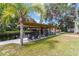 Waterfront home with a covered boat dock and lift on the river, perfect for boating and fishing at 24628 Fox Rd, Astor, FL 32102