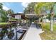 Waterfront home with a covered boat dock and lift on the river, perfect for boating and fishing at 24628 Fox Rd, Astor, FL 32102