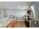 Bright kitchen with granite countertops and stainless steel appliances at 24628 Fox Rd, Astor, FL 32102