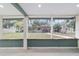 This patio area offers beautiful views of the lush backyard and waterfront at 24628 Fox Rd, Astor, FL 32102