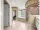 Well-lit bathroom featuring a tub, shower, and neutral tiling at 28 Golf View Dr, Ocala, FL 34472