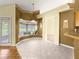 Bright breakfast nook featuring large windows overlooking a patio with spa at 28 Golf View Dr, Ocala, FL 34472