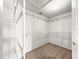 Walk-in closet with wire shelving, neutral walls and carpet at 28 Golf View Dr, Ocala, FL 34472