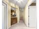 Hallway with tile floors leading to living spaces and bedrooms at 28 Golf View Dr, Ocala, FL 34472