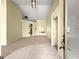 Open living area featuring neutral carpet and a light, airy atmosphere at 28 Golf View Dr, Ocala, FL 34472