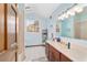 Bathroom with vanity, mirror and bright natural light at 2820 Se 14Th St, Ocala, FL 34471