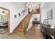Entry foyer with hardwood stairs, high ceilings, and an open floor plan at 2820 Se 14Th St, Ocala, FL 34471