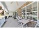 Cozy front porch with white railings, comfortable seating, and a welcoming entrance at 2820 Se 14Th St, Ocala, FL 34471