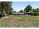 Charming single-story home with a well-manicured front lawn and a classic white picket fence at 2820 Se 14Th St, Ocala, FL 34471